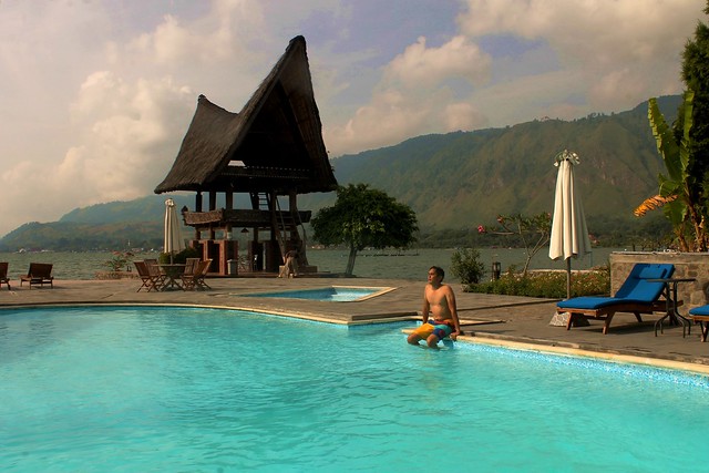 Serene Retreat: Lake Toba Parapat's Tranquil Waters and Beyond